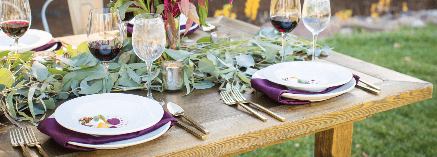table with plates and flowers