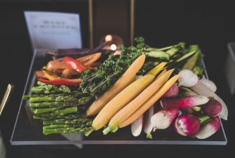 Fresh crudite display on a metal tray