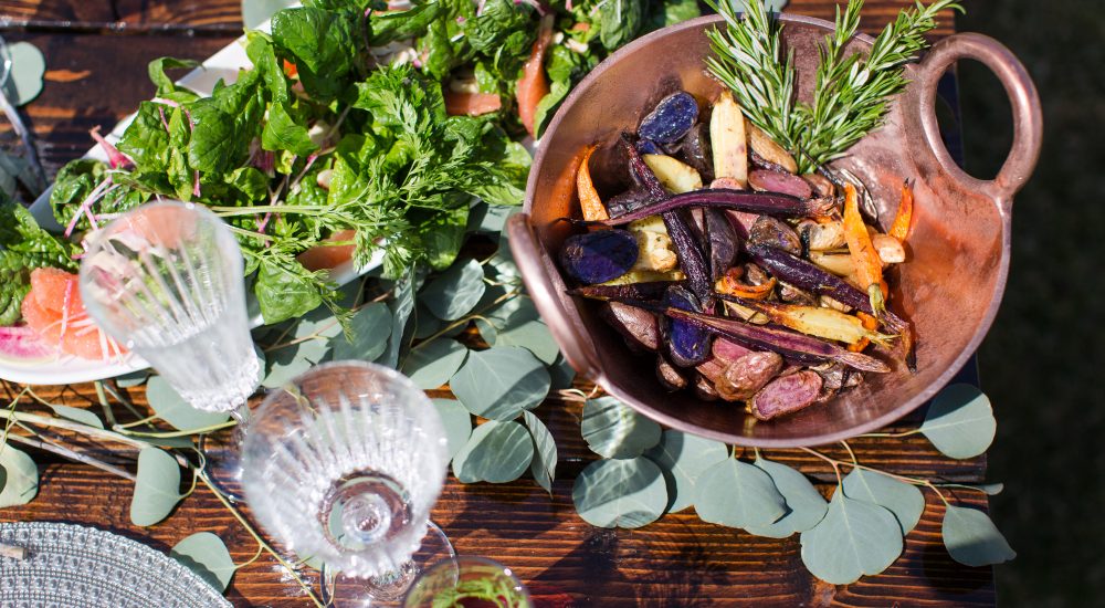 bowl of vegetables and salad on a table