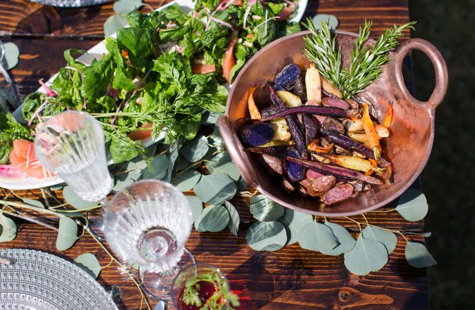 bowl of vegetables and salad on a table