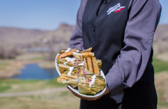 Serving a plate of delicious food at an outdoor event