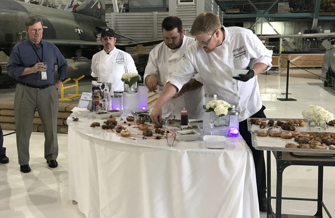 Biscuits and Berries staff decorates a specialty desert station