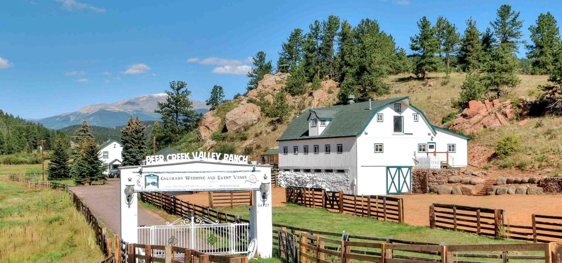 Large white barn at Deer Creek Valley Ranch