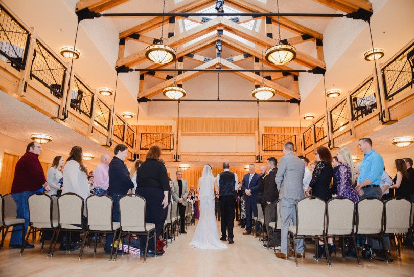 Bride and groom walking down the aisle in Silverthorne Colorado