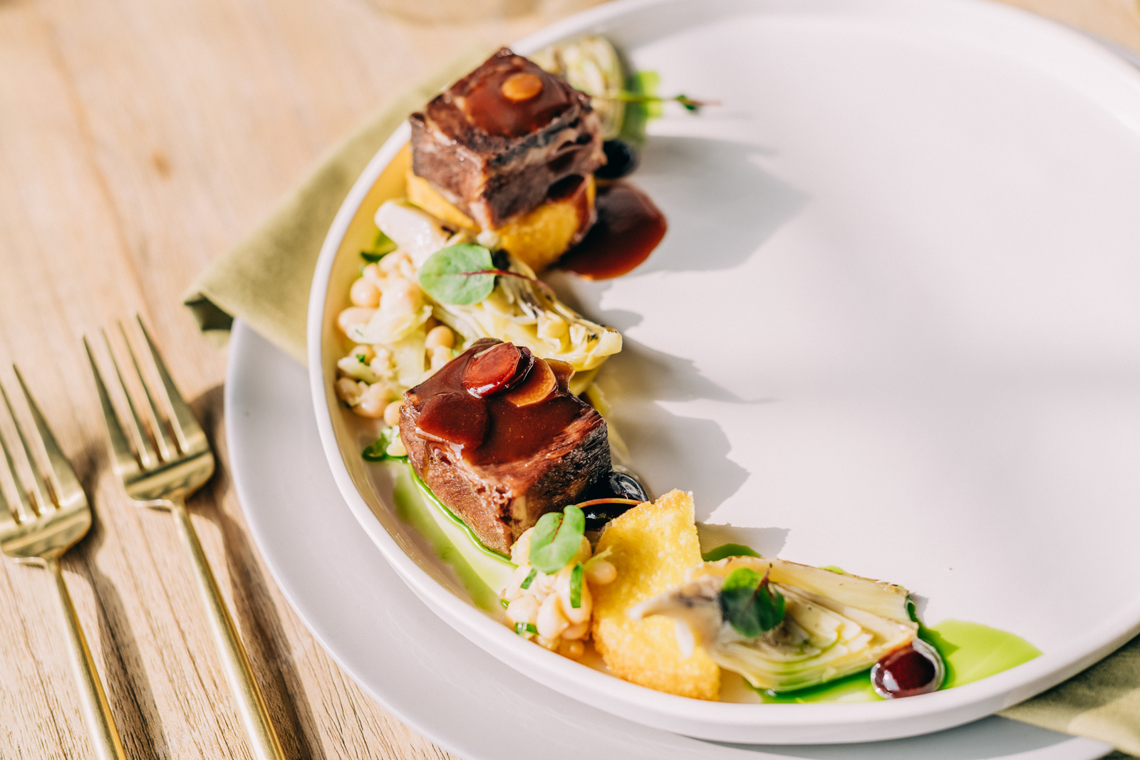 contemporary meal plated food on white place setting