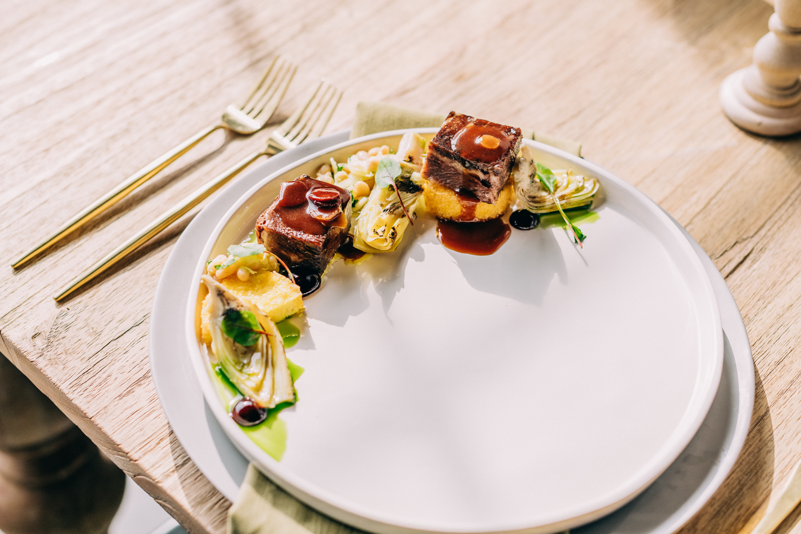 contemporary meal plated food on white place setting