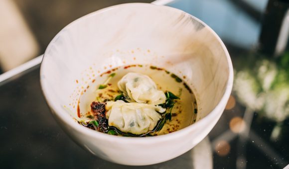 close up image of dumpling soup