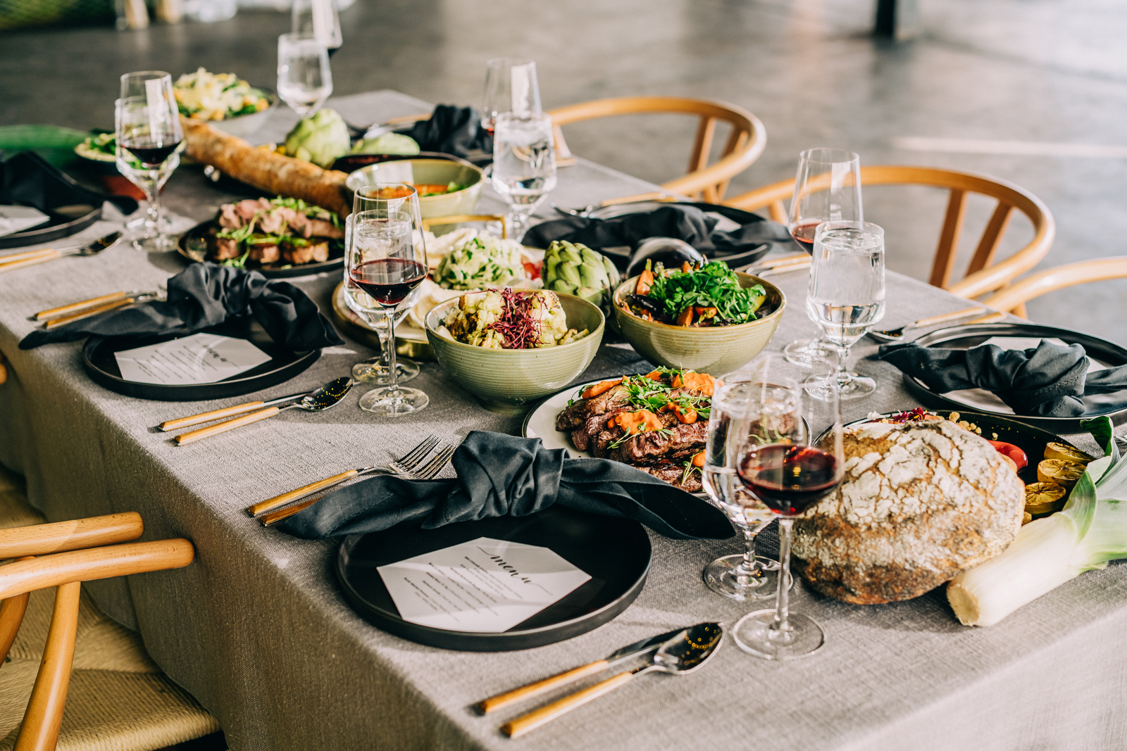 Beautifully set table with food and wine